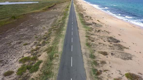 Aerial view to a road near to the sea