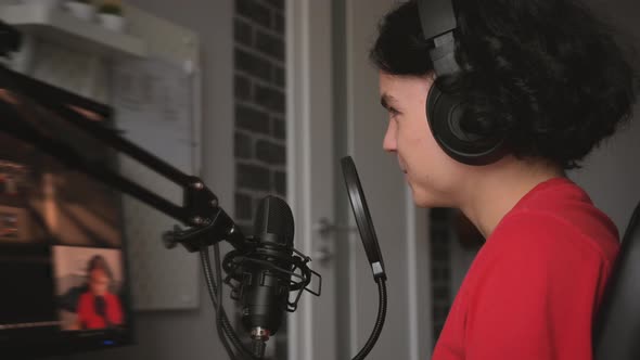 Teen Boy Plays Game on Computer alt