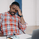 Tired african american man suffer headache at laptop thinking about business problem. Stress at work - PhotoDune Item for Sale