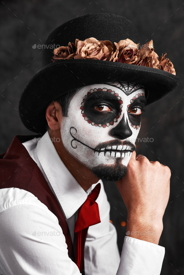 portrait of young man with white face paint. Professional Fashion Makeup.  fantasy art makeup Stock Photo