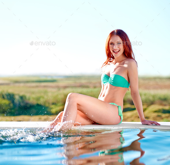 Sexy Slim Ginger Woman Loose Flowing Har Pink Swimwear Posing Stock Photo  by ©romanchazov27 647977792