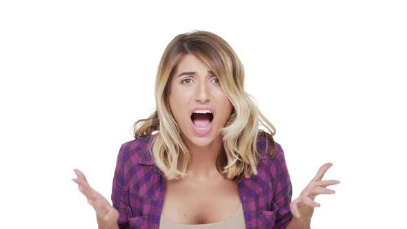 Portrait of Annoyed Longhaired Woman with Hazel Eyes Strongly Gesturing Screaming Asking Why Being alt