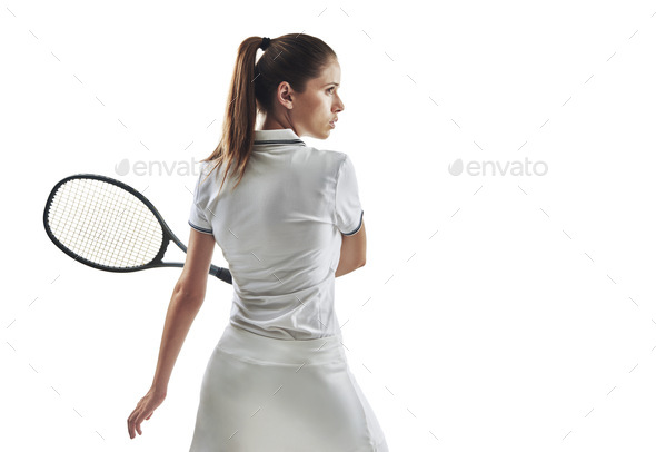 Premium Photo  Ive mastered my technique. shot of a female tennis player  posing with a racket.