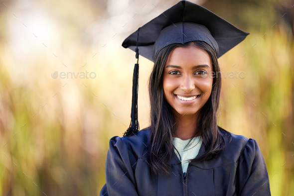 Cropped portrait of an attractive young female student celebrating on ...