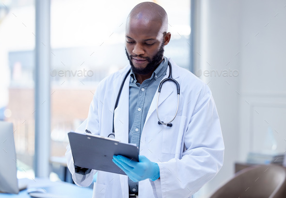 I have to hand this treatment plan over to the nurse. Shot of a male doctor filling out paperwork.
