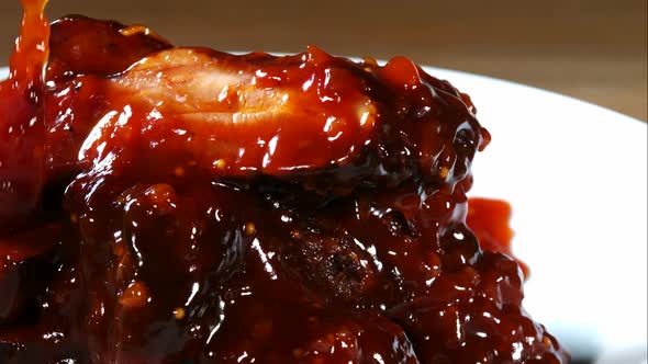 BBQ sauce pouring and splashing in ultra slow motion 1500fps onto BBQ ribs - BBQ PHANTOM 079 alt