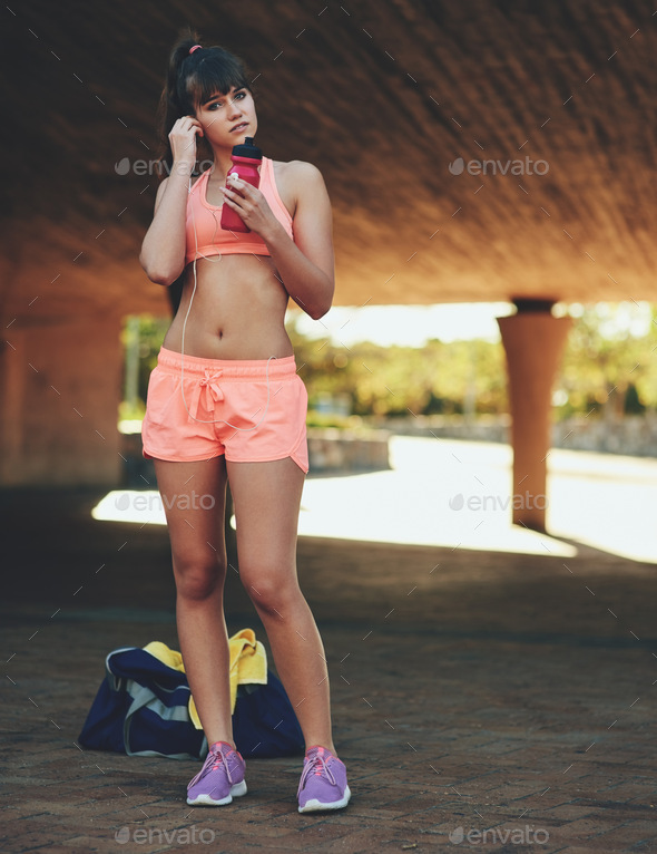 Fitness is a form of self-respect. Shot of a beautiful young woman out for her morning workout.