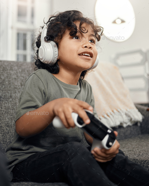 Little boy with cheap headphones