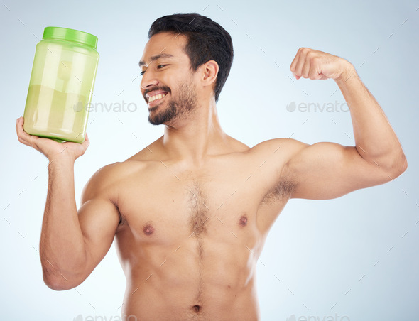 Fitness, man and protein powder for muscle gain, diet and weight loss on grey studio background. Ma