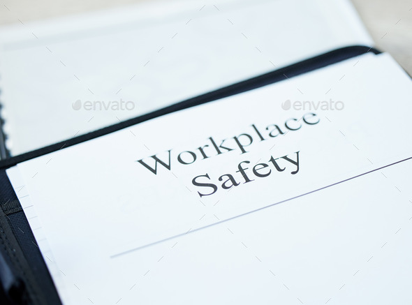 Shot of a document with Workplace Safety on it in an office