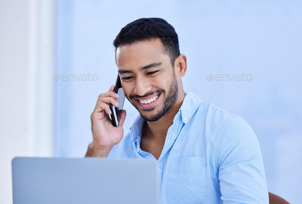 Its great to hear your voice. Shot of a young businessman working in a call center.