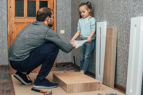 Assembling new furniture with your own hands according to the instructions, improving living
