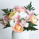 Beautiful colorful flowers in bloom in white vase. - PhotoDune Item for Sale