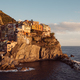 Rocky hills and colorful historic buildings of Manarola, Italy. - PhotoDune Item for Sale