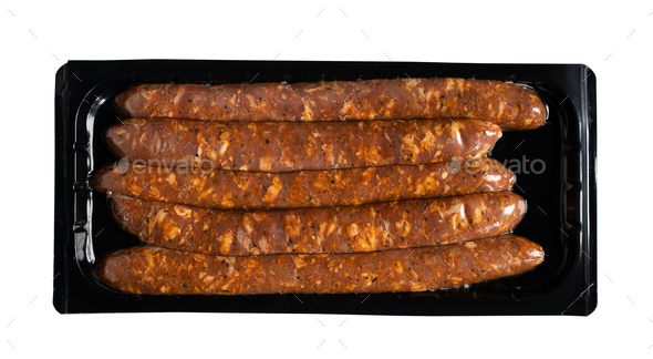 salami sausages in black transparent vacuum packaging isolated on white - Stock Photo - Images