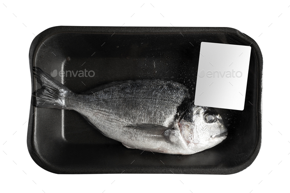 fresh sea bream in black black vacuum packaging with blank white label isolated on background - Stock Photo - Images