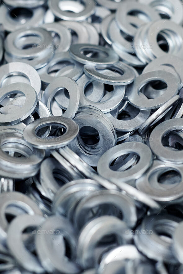 Bunch of stainless steel galvanized flat washers for fastener screws, nuts or bolts