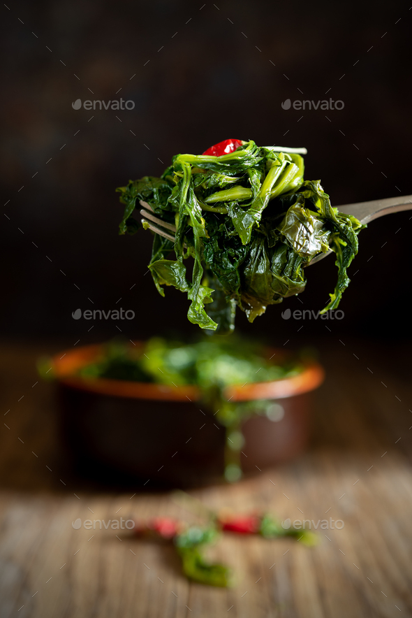 Cup of fried broccoli called friarielli typical neapolitan food - Stock Photo - Images
