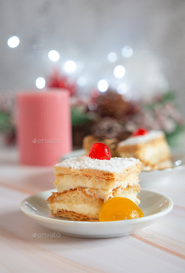 millefeuille cake with candied cherry - Stock Photo - Images