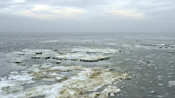 North Sea covered with ice floes, Nes, Friesland, Netherlands