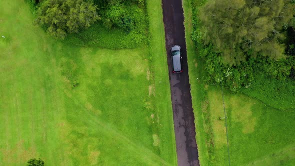 Indonesia. Aerial view on the road and car. Landscape in the Indonesia at the day time. 