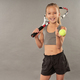 Little tennis player holding racket and yellow ball - PhotoDune Item for Sale