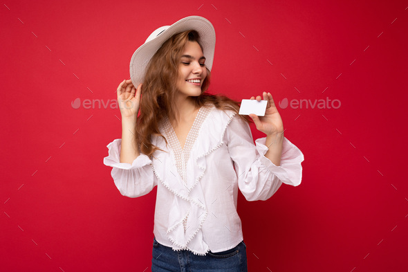 Shot Of Attractive Positive Smiling Young Dark Blonde Woman Wearing