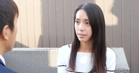 Businessman talk to woman alt