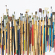 Many brushes for painting on a white background, top view. Stock Photo by  puhimec