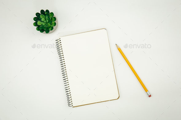 Minimalistic background with blank notepad, flat lay.