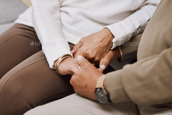 Support, trust and holding hands, senior couple in therapy or marriage counselling session. Love, c