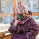 cute girl in winter in frosty weather drinks hot tea from a thermos - PhotoDune Item for Sale