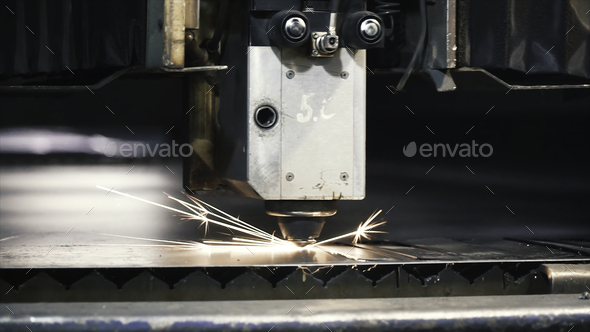 High precision CNC laser cutting metal sheet. Clip. Modern technologies allow to receive high - Stock Photo - Images