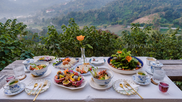 Luxury breakfast table in the mountains of Thailand Chiang Mai, outdoor breakfasdt in nature