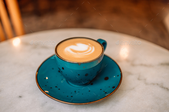 Cup of cappuccino coffee and beautiful heart Latte Art at city cafe shop, Valentine's day concept - Stock Photo - Images
