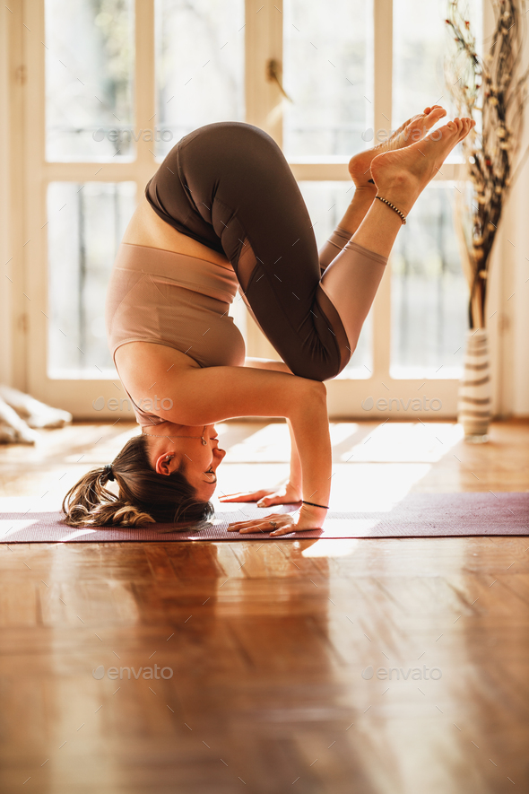 Woman Doing Yoga At Home - Stock Photo - Images