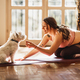 Woman Doing Yoga With Her Dog - PhotoDune Item for Sale