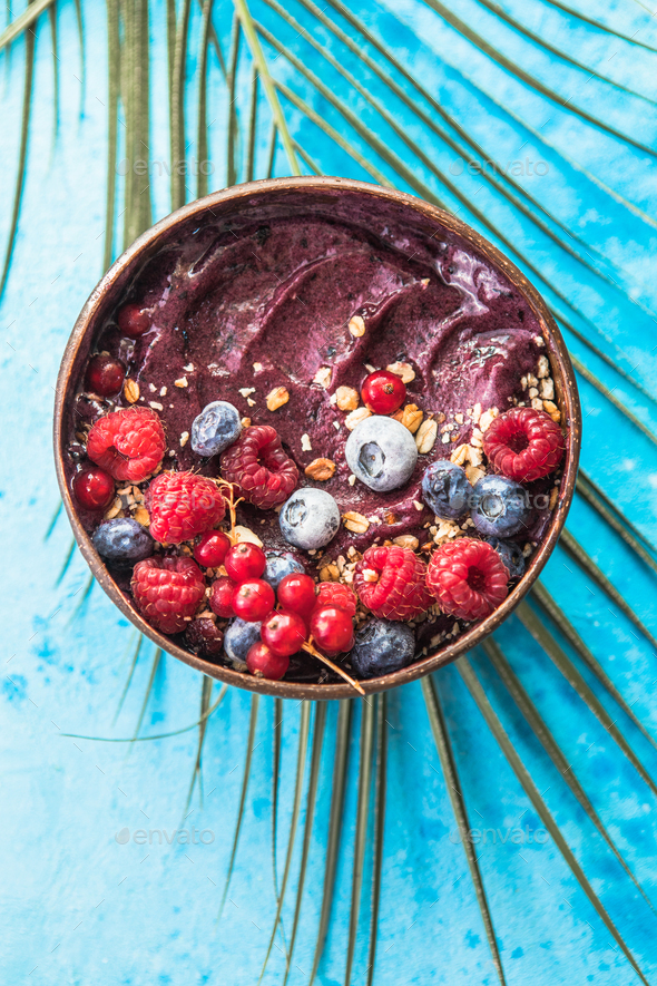 Frozen acai smoothie. Breakfast, healthy meal for summer vibes, top