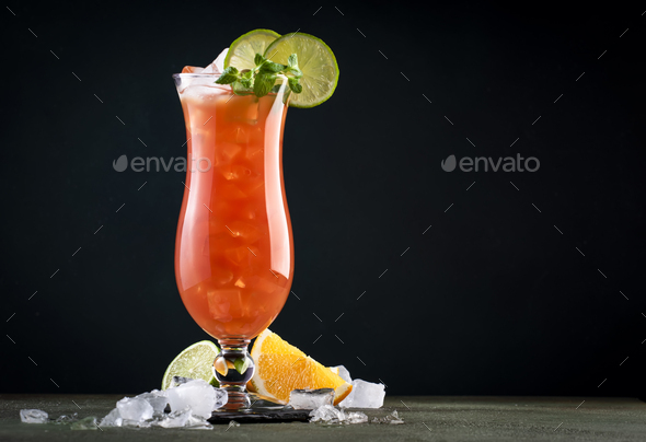 Hurricane, classic alcoholic cocktail with dark and white rum, ice, syrup, grenadine, pineapple