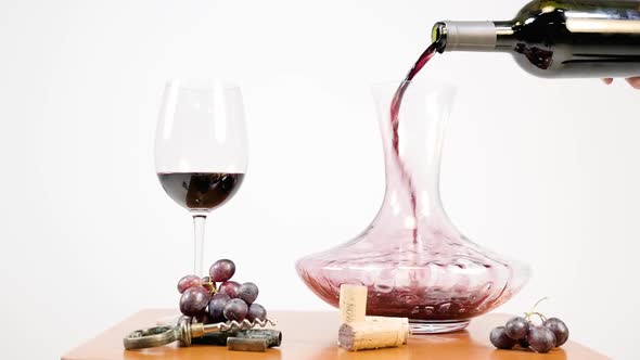 Slow Motion Serving Wine In A Decanter