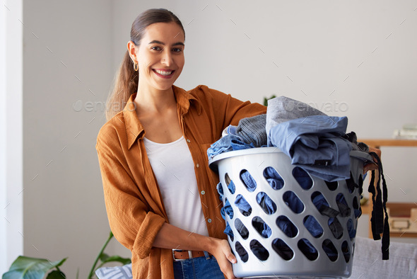 Cleaning, laundry and housekeeping with woman in living room for