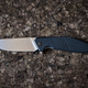 Jackknife or flick-knife on cork tree background, close up. - PhotoDune Item for Sale