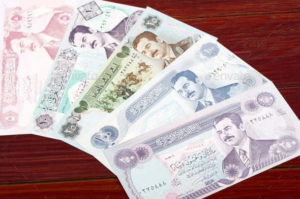 Old Iraqi dinar a business background - Stock Photo - Images