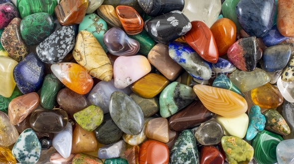 Pile of colorful, shiny stones with patterns on them - perfect for ...