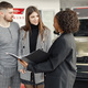 Young couple with a sales agent is going to buy a car - PhotoDune Item for Sale