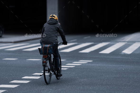 Riding a bike in the city - Stock Photo - Images