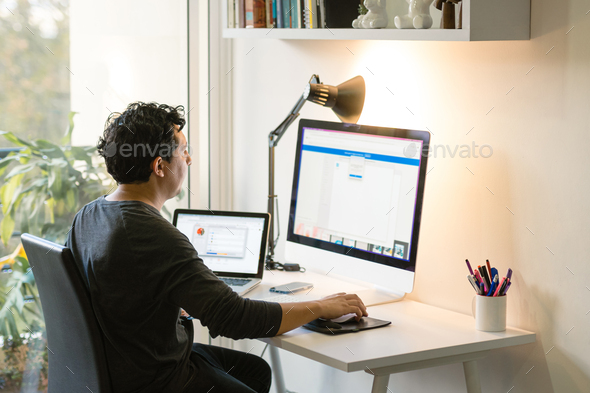 Home office with minimalist design. Graphic designer working from home.  Stock Photo by JulisarmiJSX80