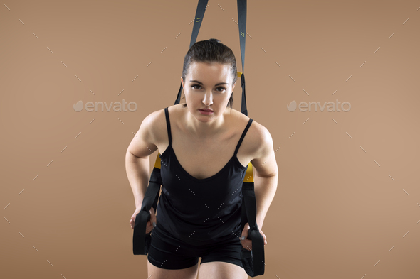 Portrait of fitness athletic young woman. Female model with