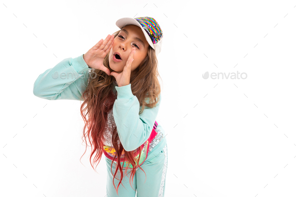 Little pretty caucasian girl in a tracksuit screams to someone, picture isolated on white background