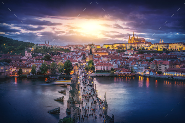 Aerial view of Charles Bridge at sunset with Prague Castle Skyline - Prague, Czech Republic - Stock Photo - Images